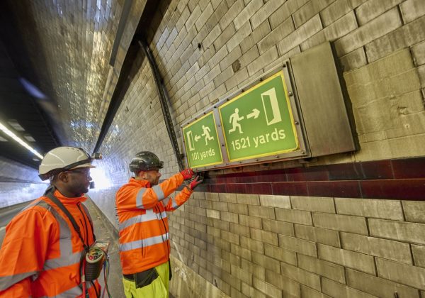 Bespoke Stainless Steel LED Emergency Exit Signage for Major UK Road Tunnel Project